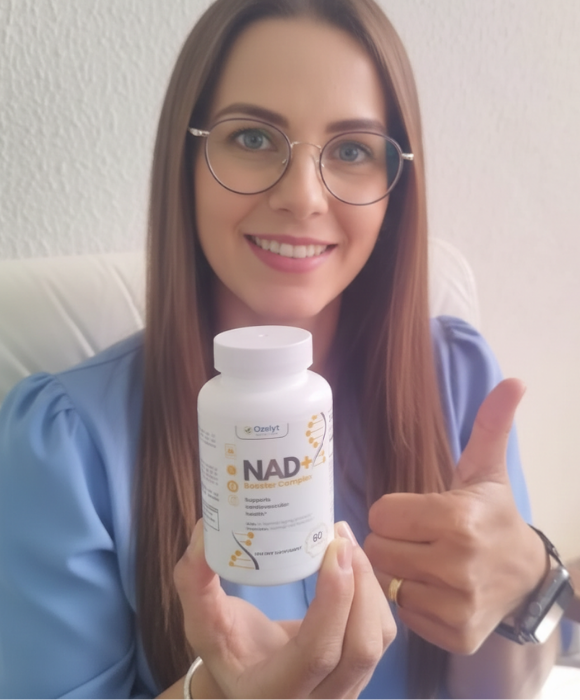 Laura R. holding NAD+ Booster Complex bottle